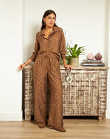 PANTALÓN FLORES MONA MARRÓN - Monica Ecco