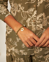 PULSERA CRISTAL ELÁSTICA CHAPA VERDE - Monica Ecco